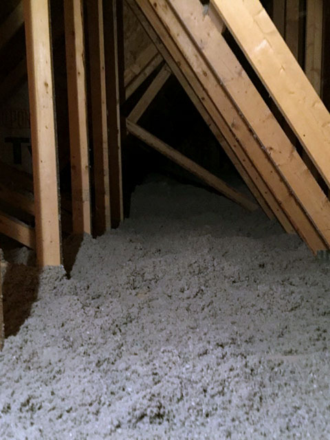 attic after restoration is complete with fresh new insulation