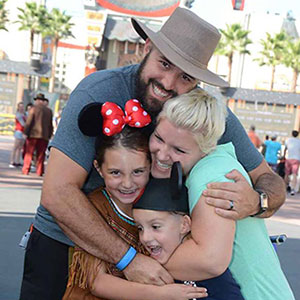 My Bat Guy Owner Ron Pelshaw with his wife and two kids at Disney